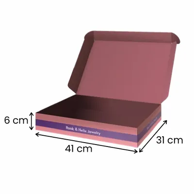41 x 31 x 6 cm This is a custom-branded cardboard jewellery box with a patterned design and the company name 'Rook & Helix jewellery' printed inside the lid.