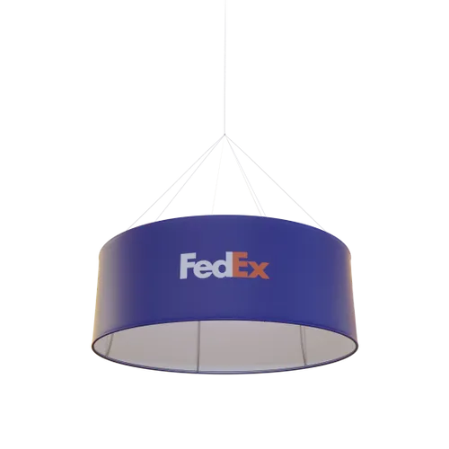 A hanging circular banner displays the FedEx logo for promotional purposes at a probable trade show or commercial event.